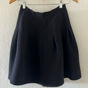 Pleated black skirt with lining, great for casual or evening!